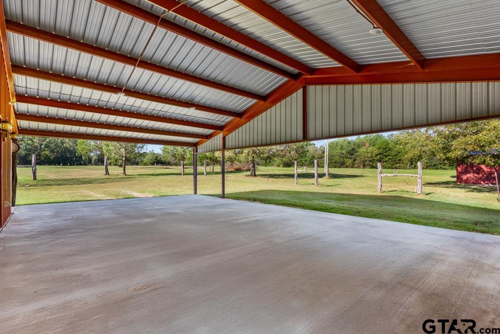 3400 Pony Road Gilmer, TX 75644 - Photo 19 of 46 a view of a house with a backyard