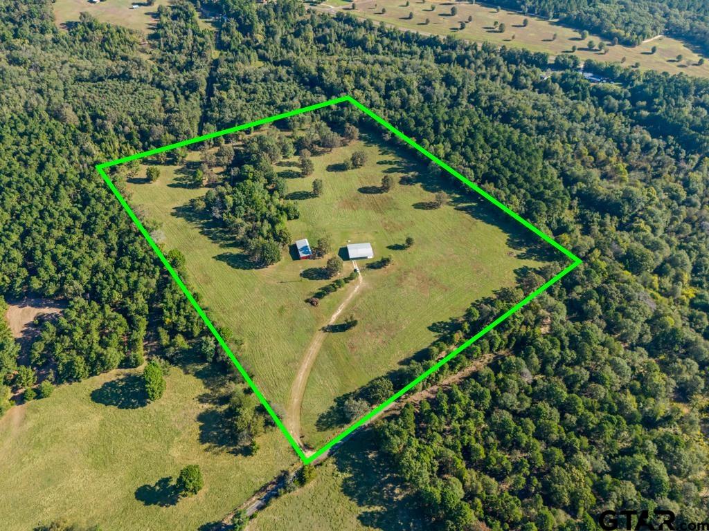 3400 Pony Road Gilmer, TX 75644 - Photo 44 of 46 an aerial view of a residential houses with outdoor space