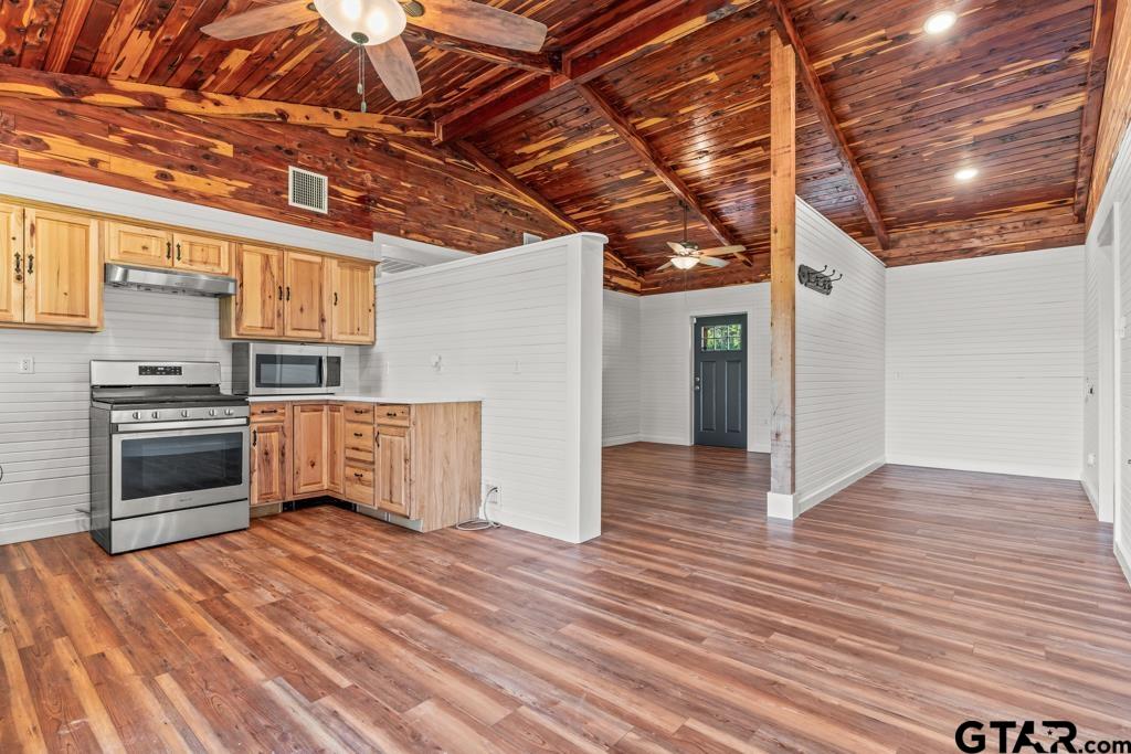 3400 Pony Road Gilmer, TX 75644 - Photo 6 of 46 a view of empty room with wooden floor