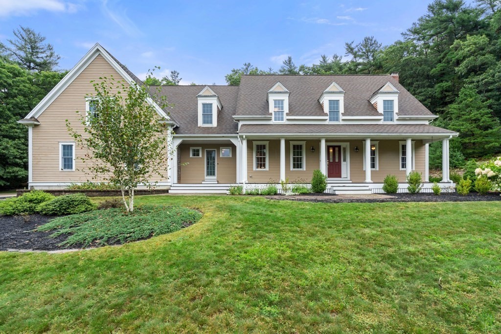 21 Guide Post Pth Path Marshfield, MA 02050 - Photo 1 of 34 a front view of a house with a yard