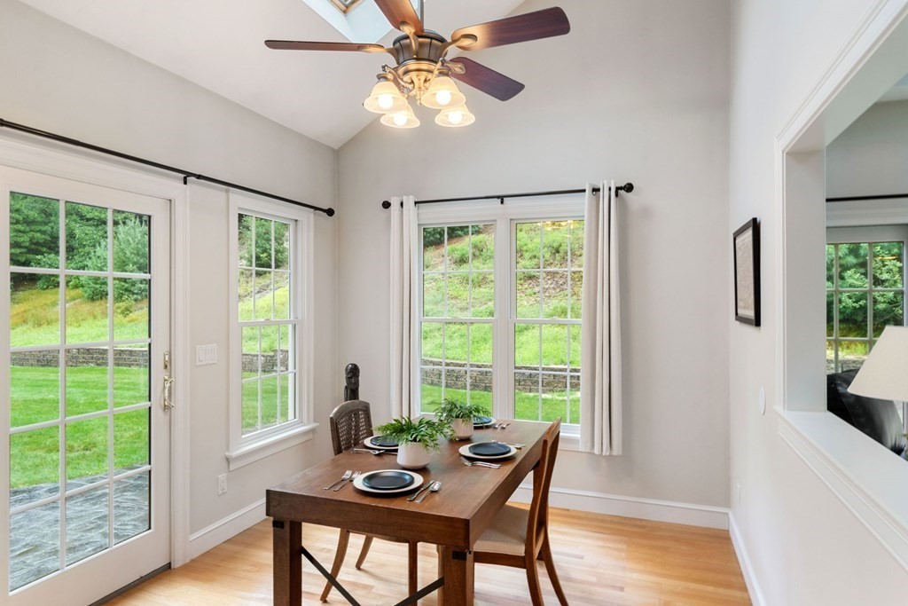 21 Guide Post Pth Path Marshfield, MA 02050 - Photo 13 of 34 a view of a dining room with furniture window and wooden floor