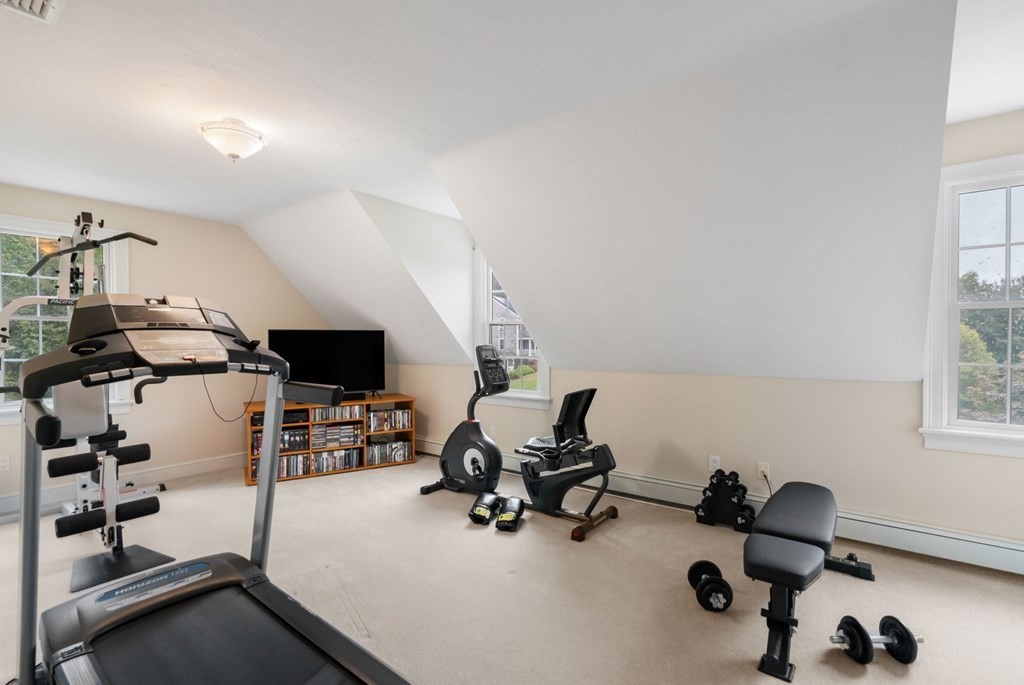 21 Guide Post Pth Path Marshfield, MA 02050 - Photo 21 of 34 a view of a workspace with gym equipment