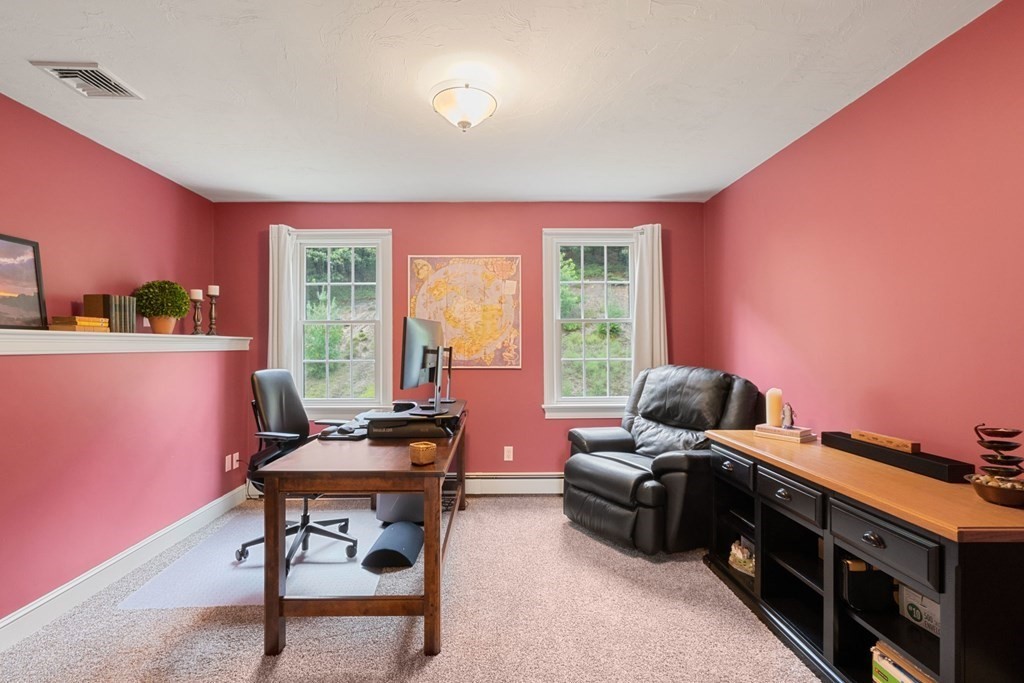 21 Guide Post Pth Path Marshfield, MA 02050 - Photo 22 of 34 a living room with furniture and a window