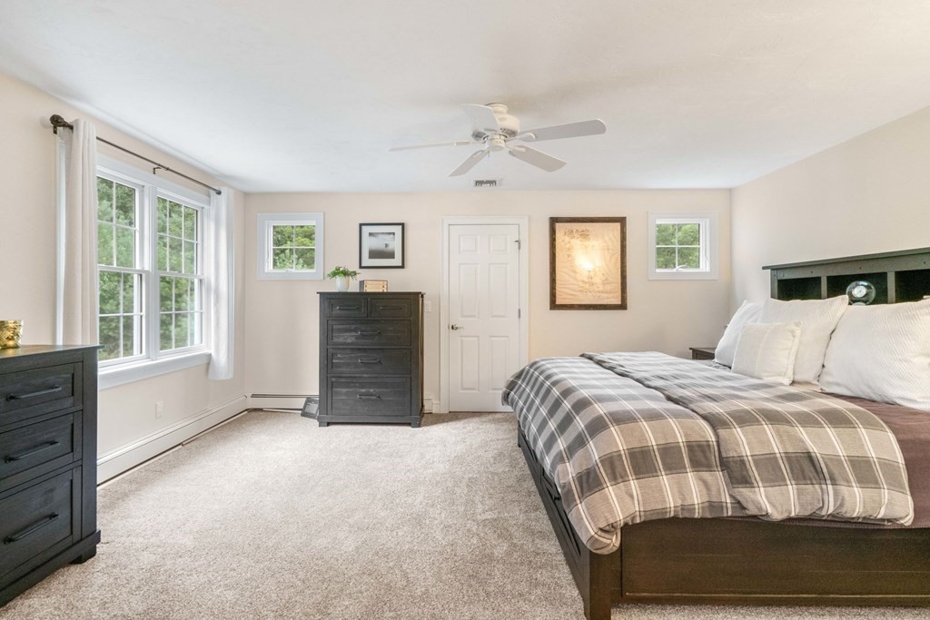 21 Guide Post Pth Path Marshfield, MA 02050 - Photo 23 of 34 a bedroom with a bed and a window