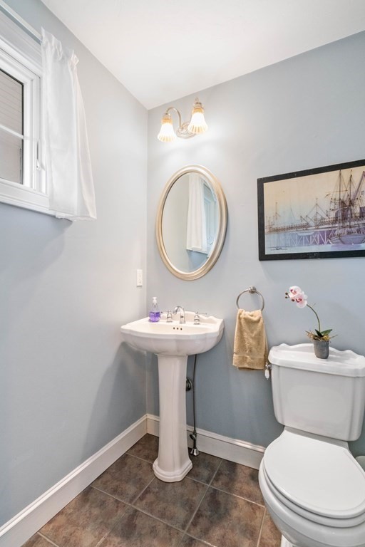 21 Guide Post Pth Path Marshfield, MA 02050 - Photo 27 of 34 a white toilet sitting next to a bathroom sink