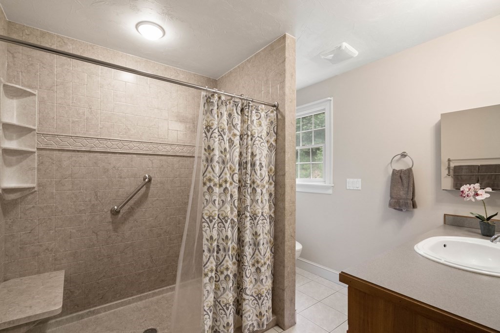 21 Guide Post Pth Path Marshfield, MA 02050 - Photo 28 of 34 a bathroom with a sink toilet and shower