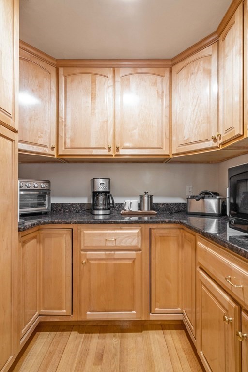 21 Guide Post Pth Path Marshfield, MA 02050 - Photo 9 of 34 a kitchen with stainless steel appliances granite countertop a sink a stove and cabinets