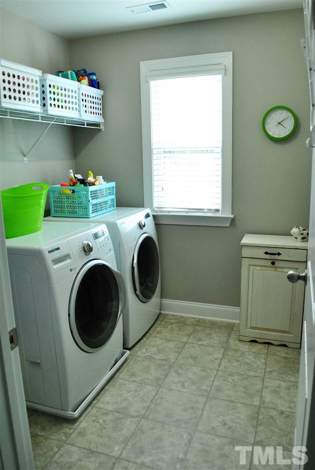 100 Maraketch Court Raleigh, NC 27603 - Photo 16 of 22 a utility room with dryer and washer