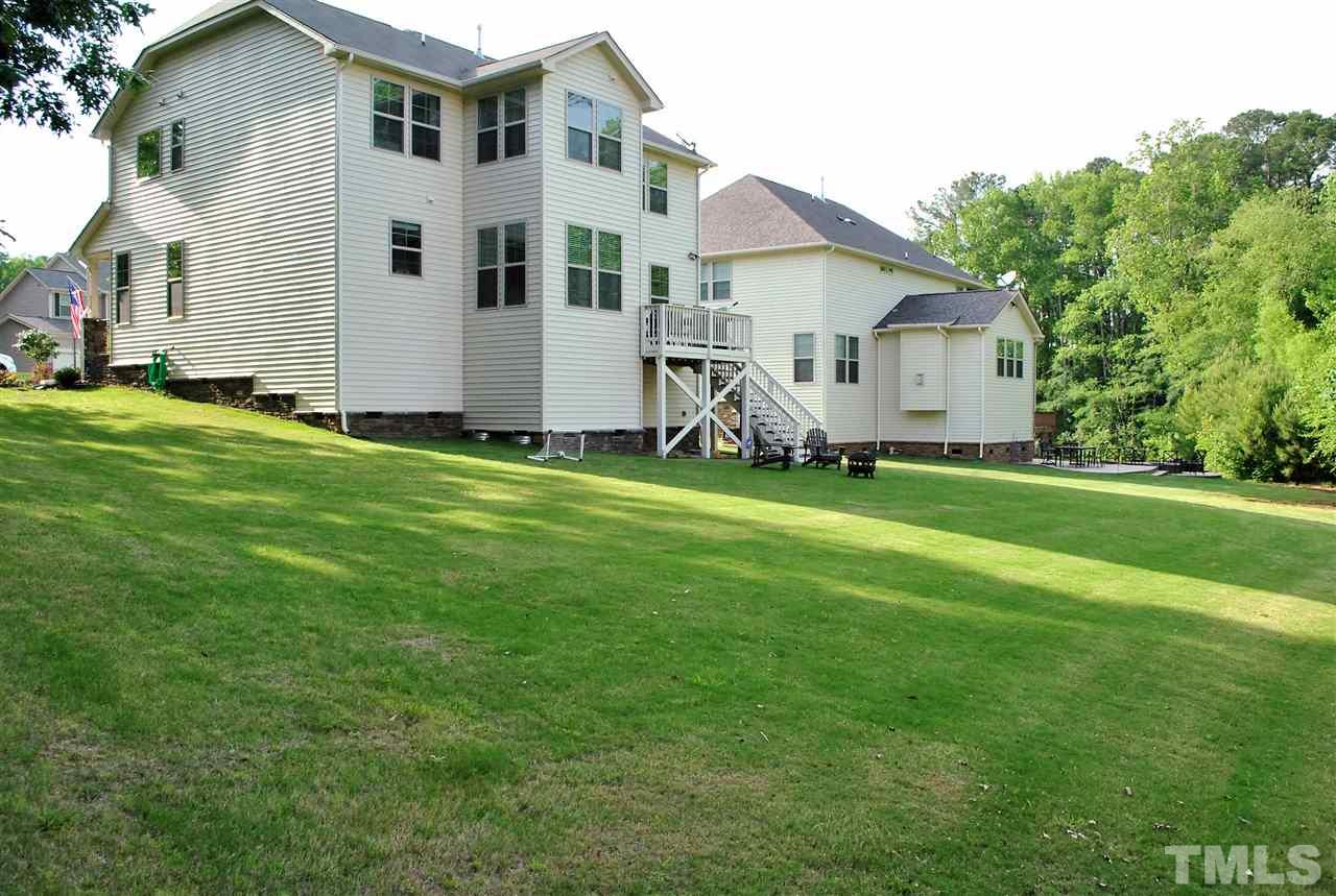 100 Maraketch Court Raleigh, NC 27603 - Photo 18 of 22 a front view of a house with a yard