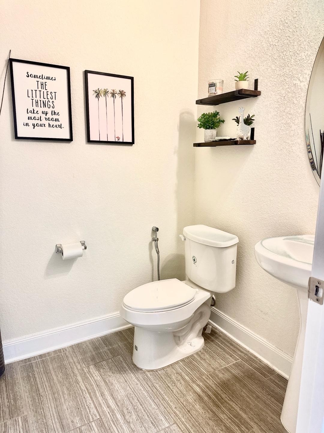 1110 Penny Ranch Lane Katy, TX 77494 - Photo 7 of 31 a bathroom with a toilet and a shower