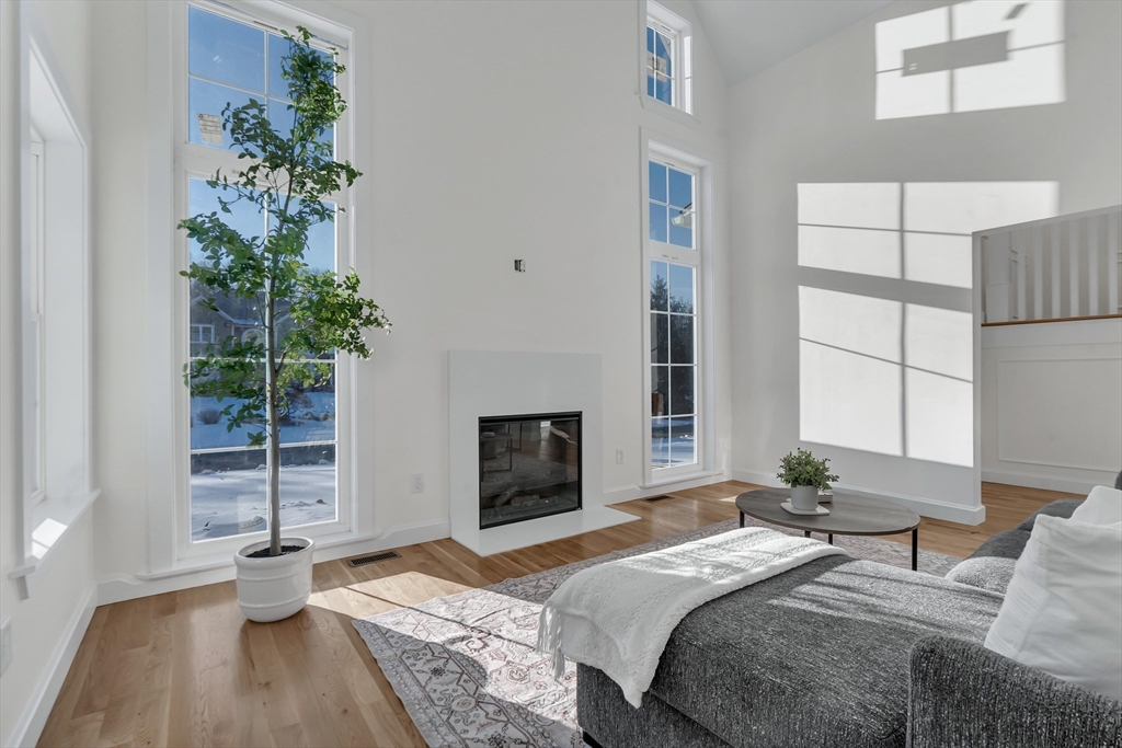 25 Columbine Road Rehoboth, MA 02769 - Photo 12 of 42 a bedroom with a bed and a potted plant