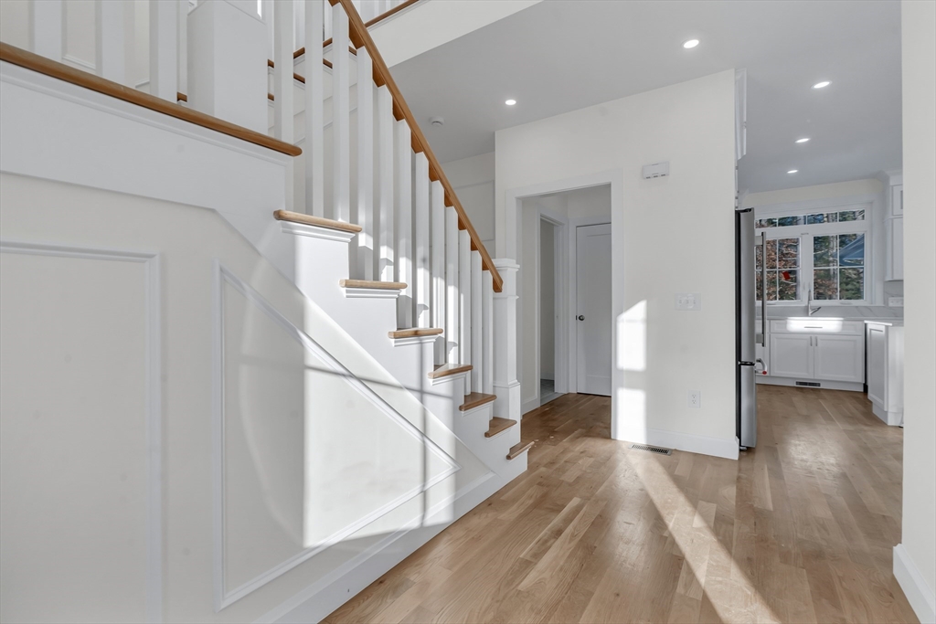 25 Columbine Road Rehoboth, MA 02769 - Photo 16 of 42 a view of entryway with wooden floor and stairs