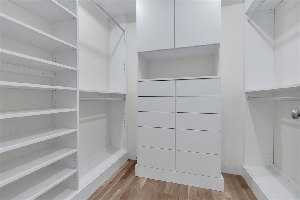 25 Columbine Road Rehoboth, MA 02769 - Photo 25 of 42 a view of walk in closet with empty racks