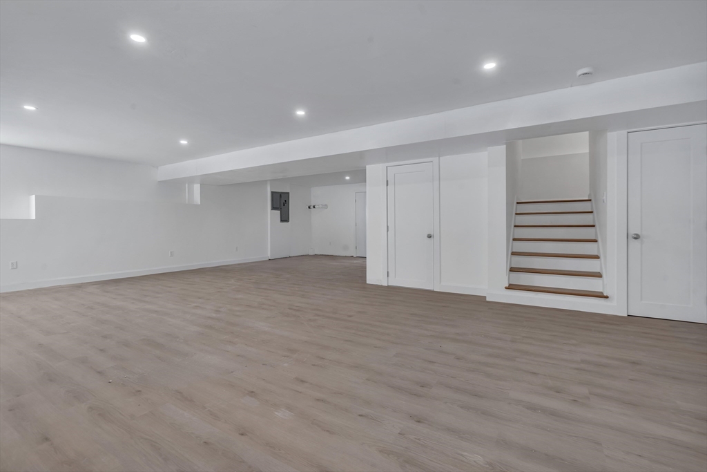 25 Columbine Road Rehoboth, MA 02769 - Photo 35 of 42 a view of an empty room with wooden floor