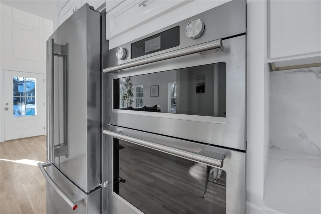 25 Columbine Road Rehoboth, MA 02769 - Photo 5 of 42 a kitchen with a stove and a microwave