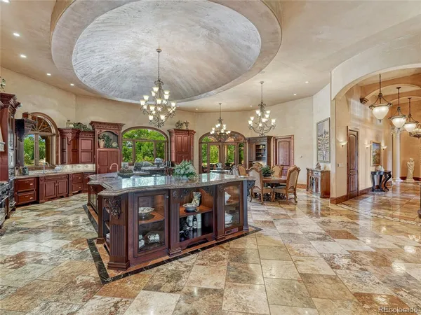 a room with furniture pool table and flat screen tv