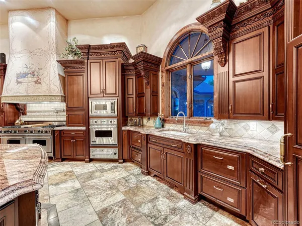 a view of a balcony with a yard