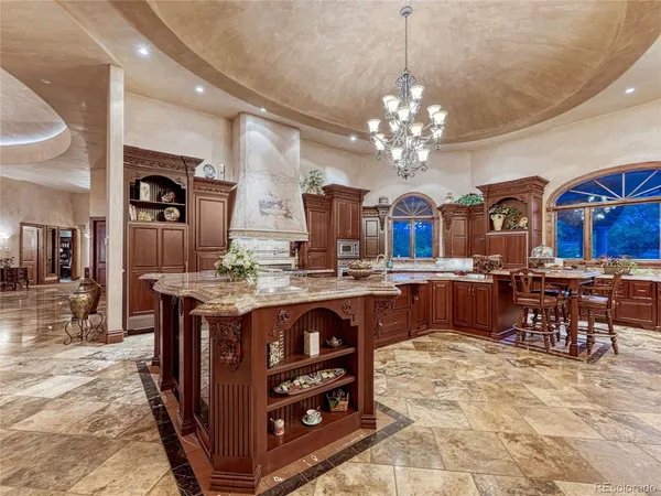 a bathroom with a sink a mirror and shower