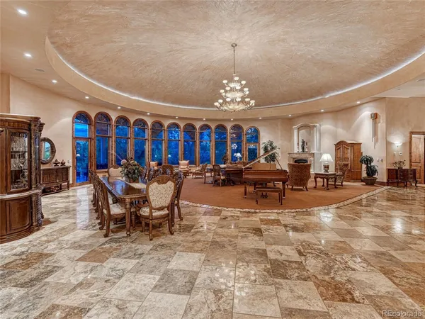 a bathroom with a sink mirror and toilet