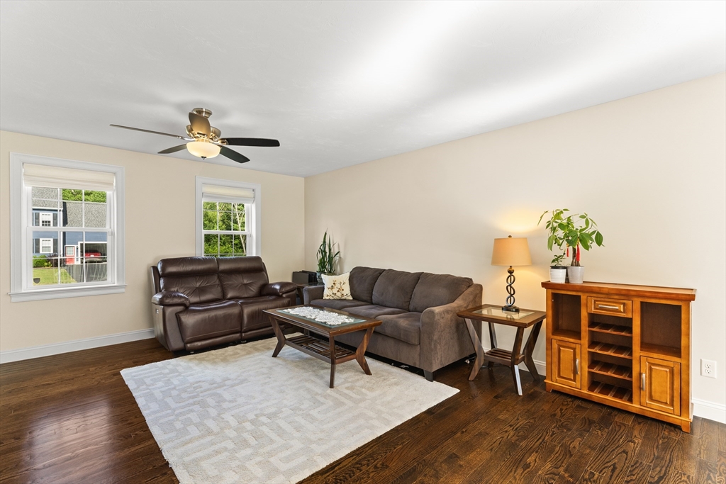 15 Carlton Street Raynham, MA 02767 - Photo 14 of 34 a living room with furniture and wooden floor