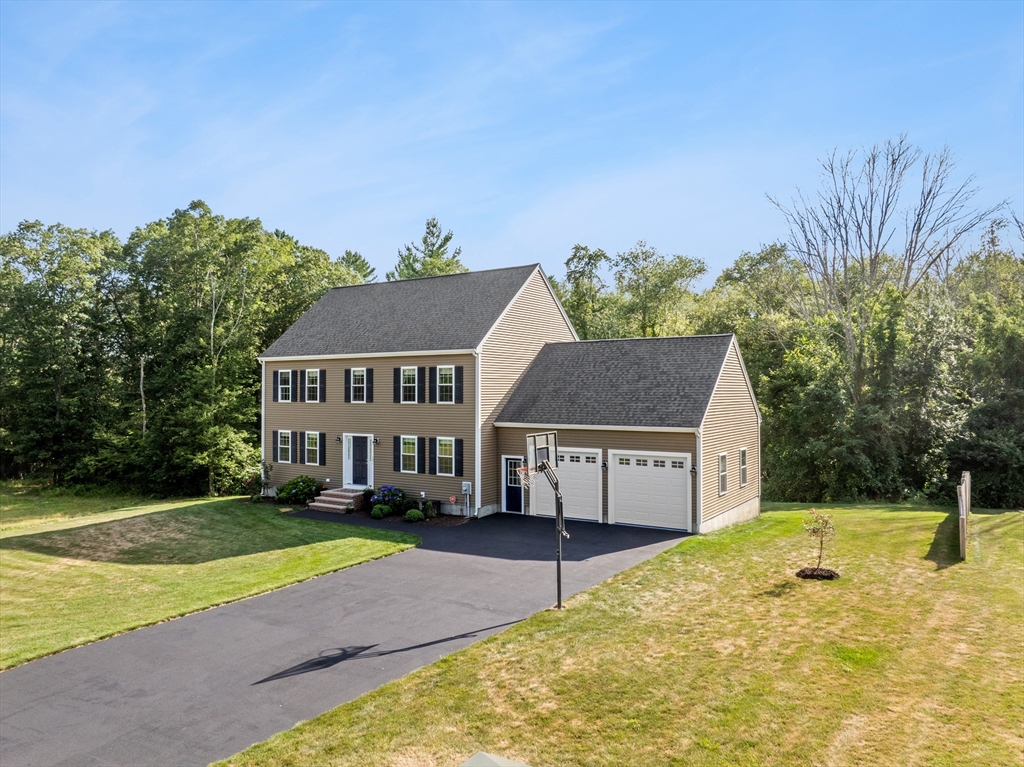 15 Carlton Street Raynham, MA 02767 - Photo 2 of 34 a view of house with outdoor space