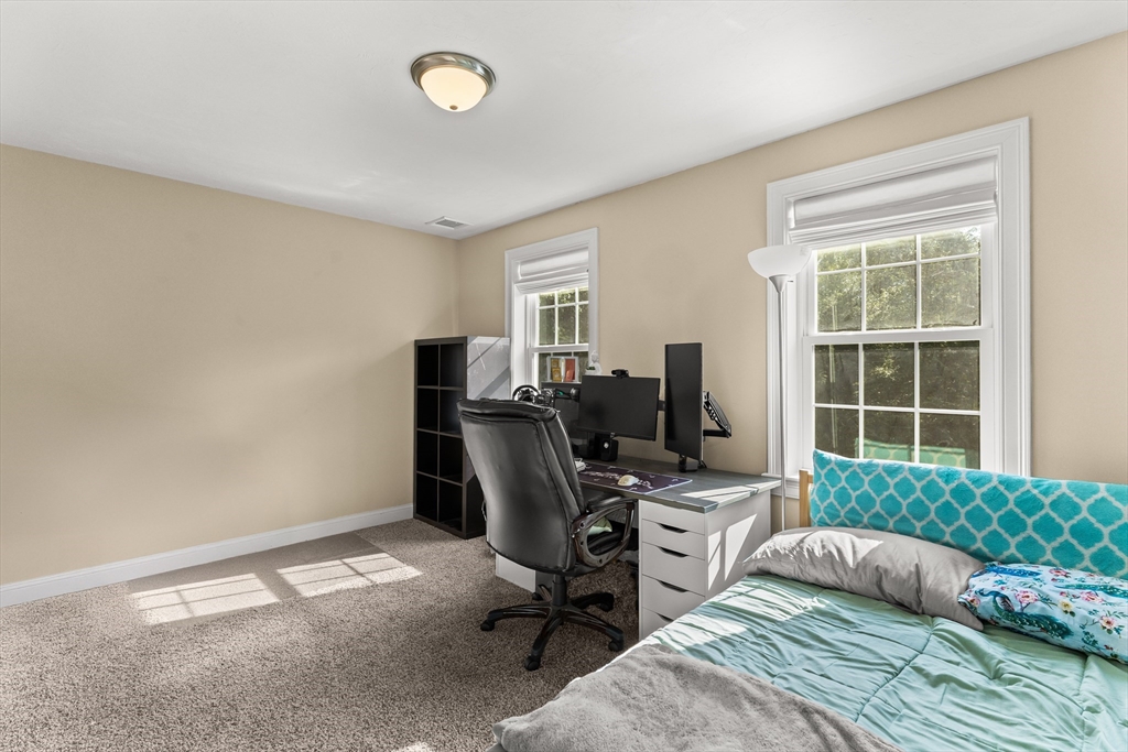 15 Carlton Street Raynham, MA 02767 - Photo 29 of 34 a bedroom with a bed and a window