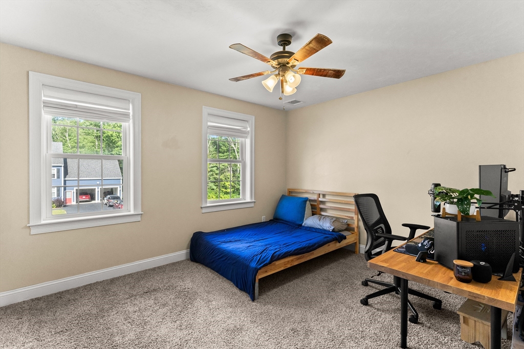 15 Carlton Street Raynham, MA 02767 - Photo 30 of 34 a living room with furniture and a window