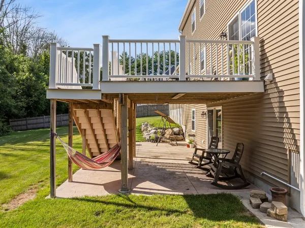 a view of a chairs and tables in the patio