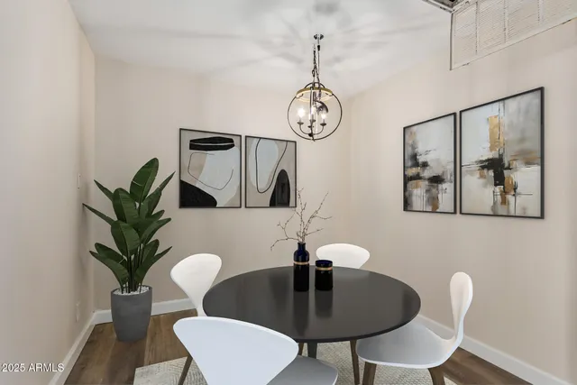 a kitchen with cabinets stainless steel appliances and a window