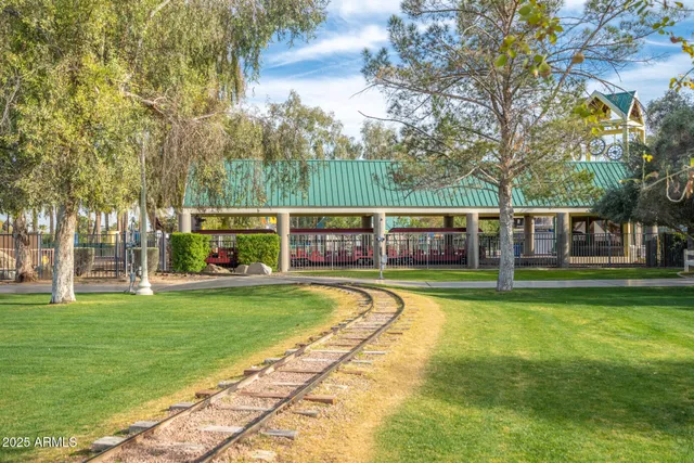 a view of a street with a building in the background