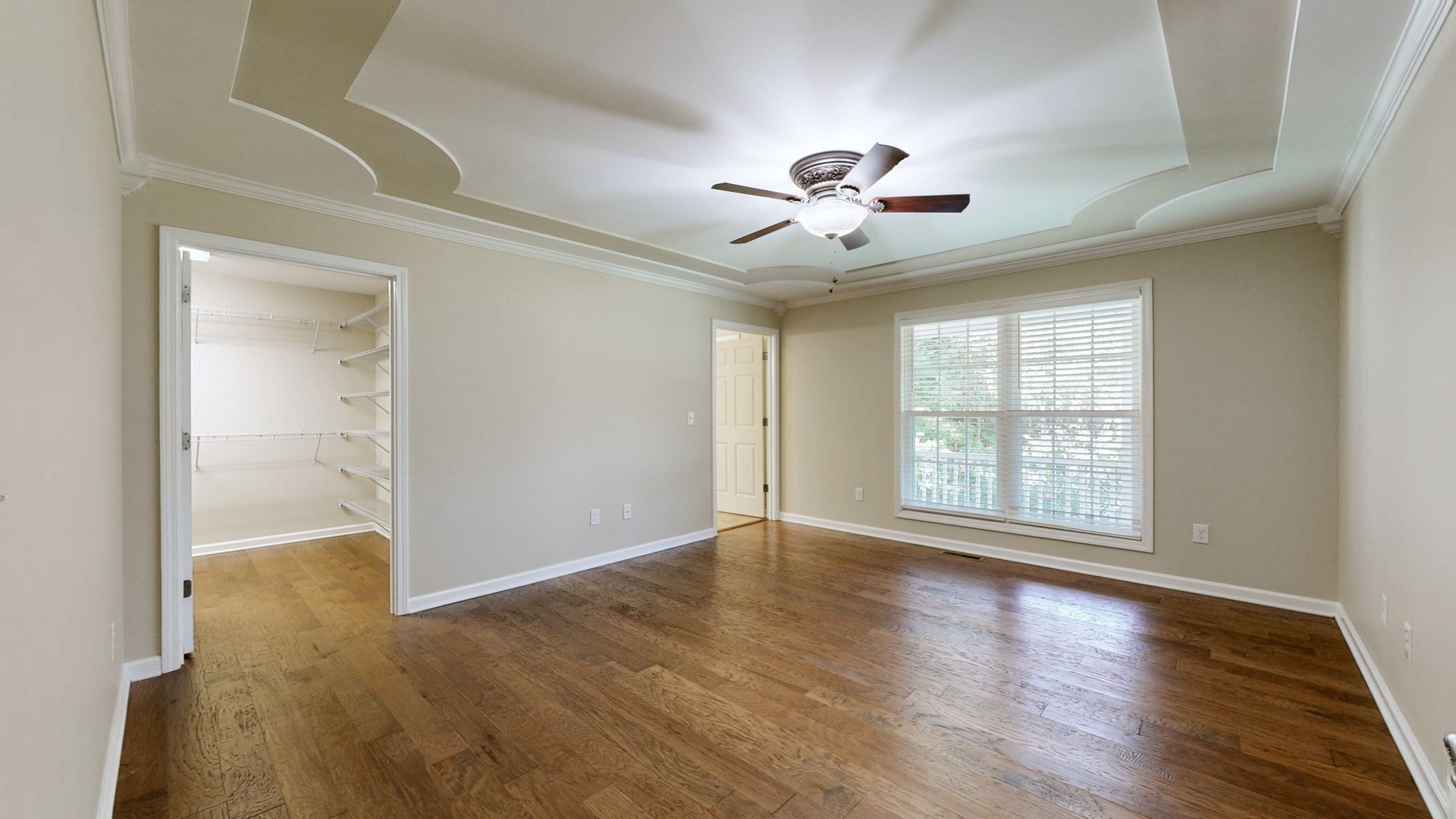 5430 Wiley Hollow Road Culleoka, TN 38451 - Photo 17 of 54 a view of an empty room with wooden floor and a window