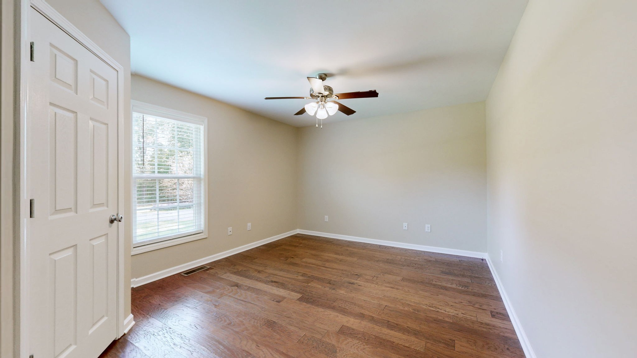 5430 Wiley Hollow Road Culleoka, TN 38451 - Photo 22 of 54 wooden floor in an empty room with a window