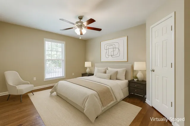 an aerial view of residential house with outdoor space and trees all around
