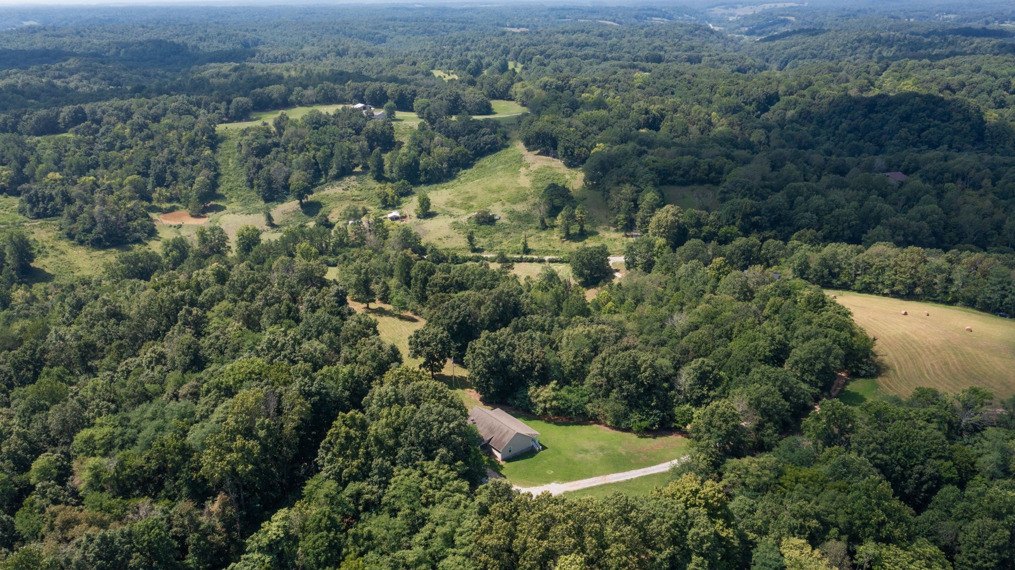 5430 Wiley Hollow Road Culleoka, TN 38451 - Photo 47 of 54 an aerial view of residential house with outdoor space and trees all around