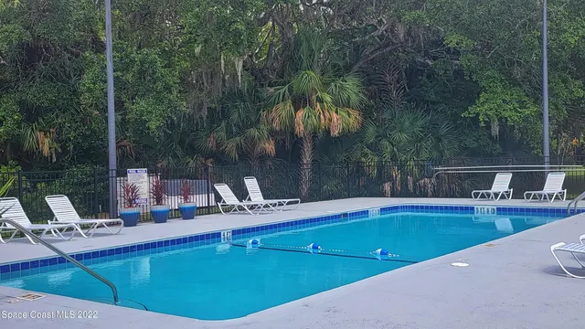 a view of a house with swimming pool