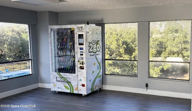swimming pool view with a garden space