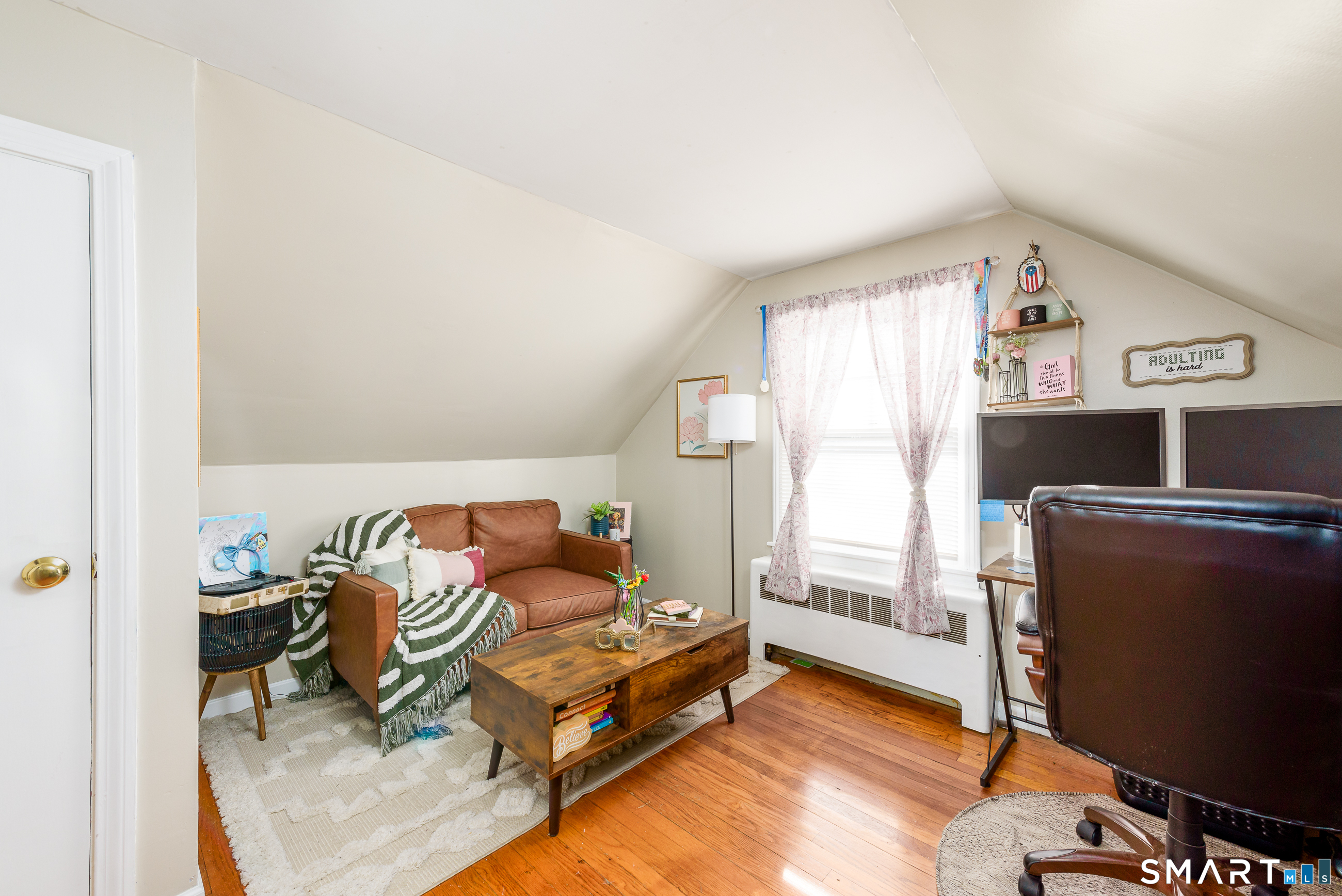 1035 North Worthy Street Windsor, CT 06095 - Photo 19 of 34 a bedroom with furniture and a window