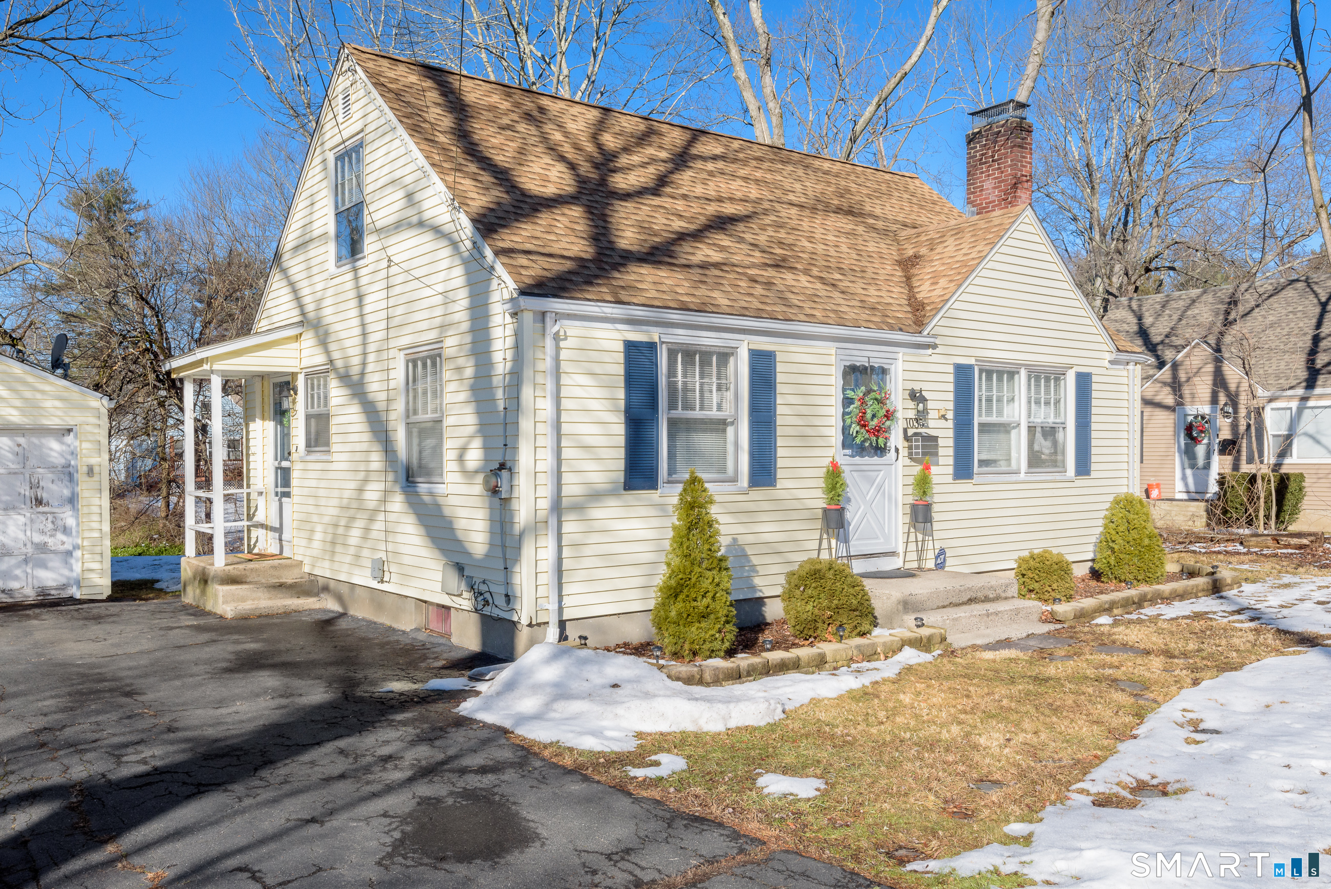 1035 North Worthy Street Windsor, CT 06095 - Photo 6 of 34 a view of a house with snow on the road