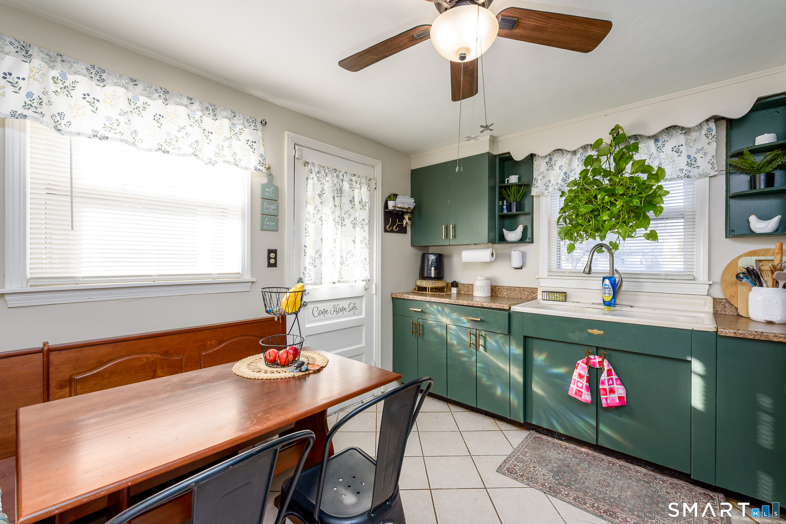 1035 North Worthy Street Windsor, CT 06095 - Photo 7 of 34 a kitchen with stainless steel appliances kitchen island a large island in the middle