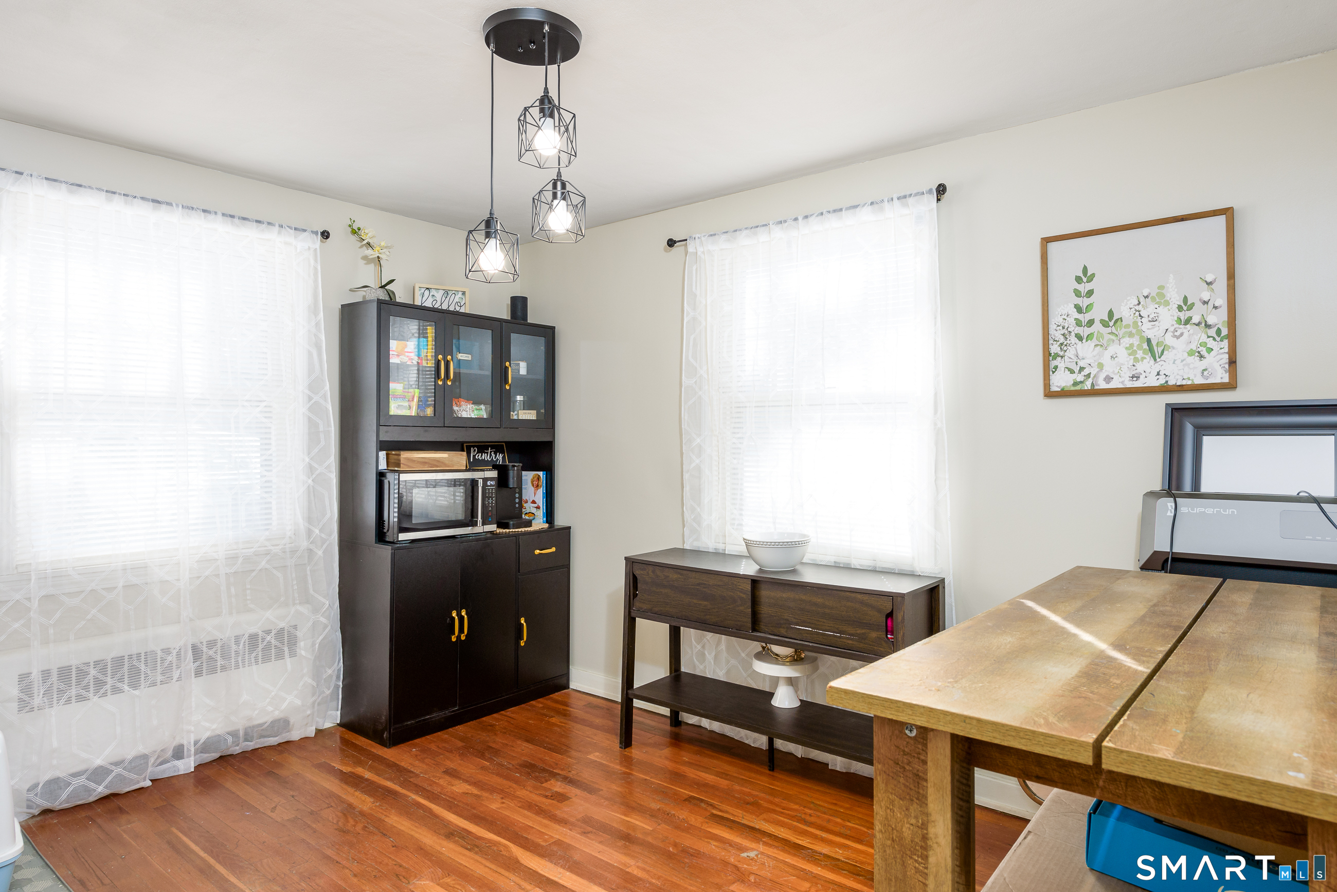 1035 North Worthy Street Windsor, CT 06095 - Photo 10 of 34 a bedroom with a bed and a table