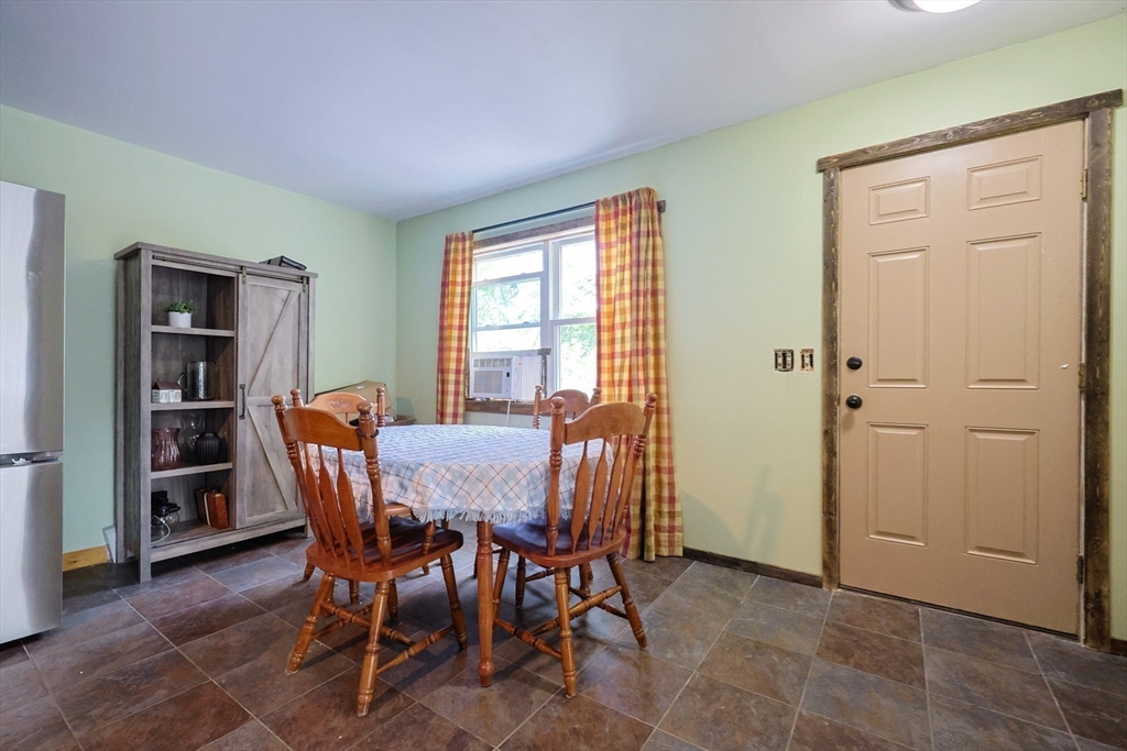 74 Breen Road Hardwick, MA 01037 - Photo 12 of 22 a view of a dining room with furniture and window