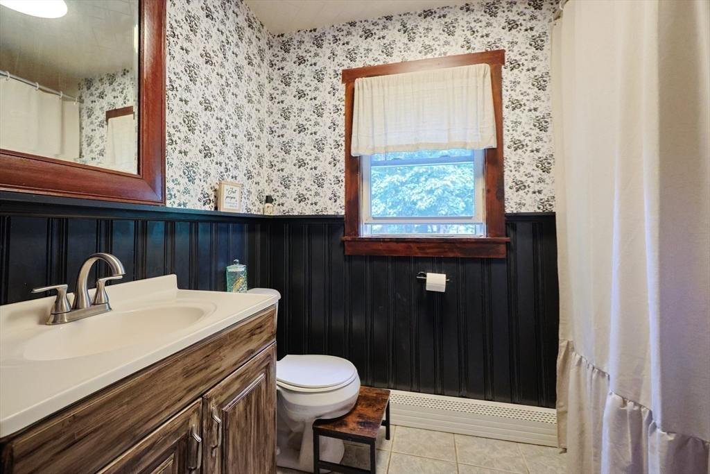 74 Breen Road Hardwick, MA 01037 - Photo 16 of 22 a bathroom with a sink a toilet and shower
