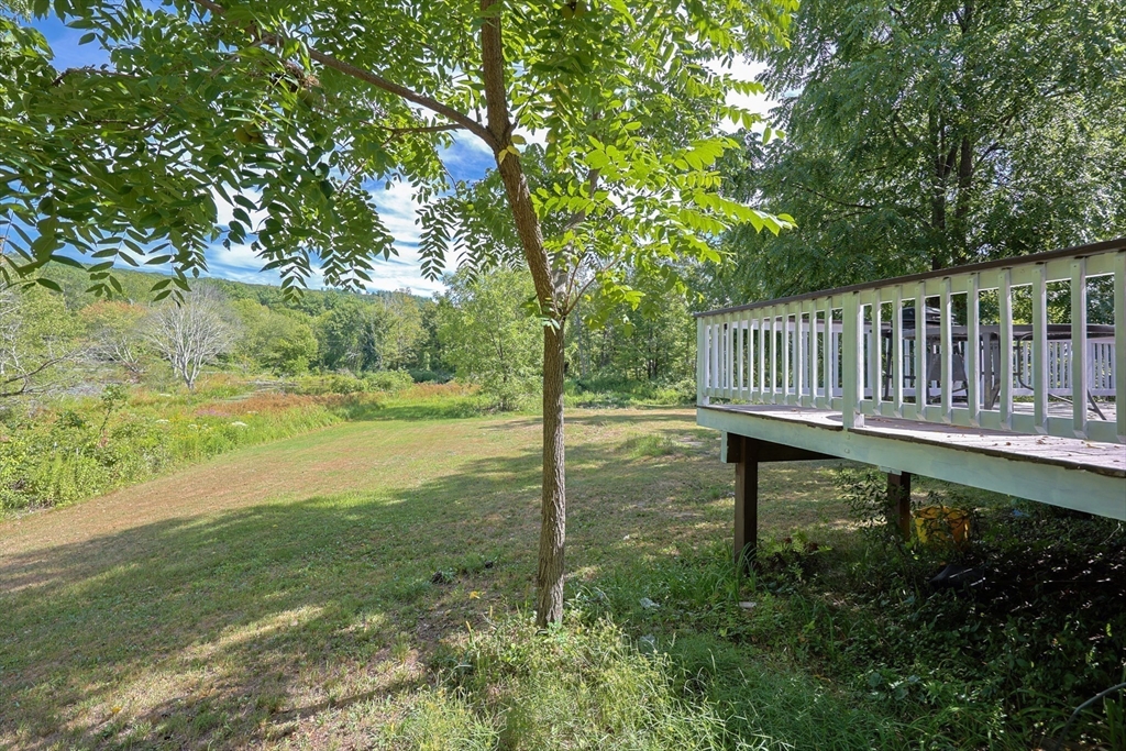 74 Breen Road Hardwick, MA 01037 - Photo 20 of 22 a view of a yard with wooden fence