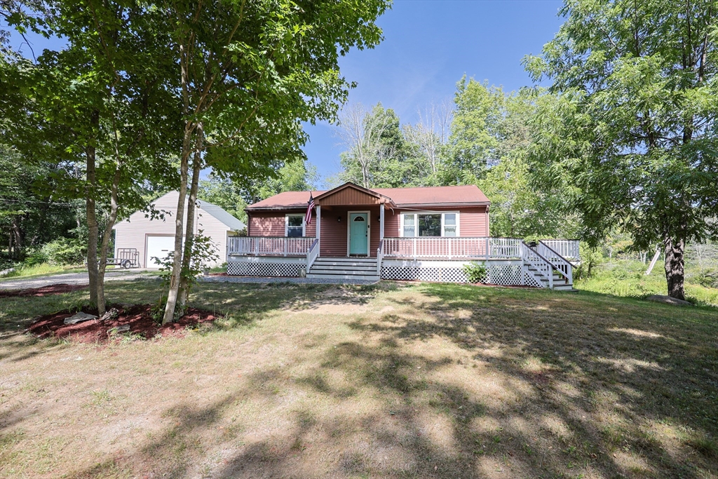 74 Breen Road Hardwick, MA 01037 - Photo 22 of 22 a front view of a house with a yard