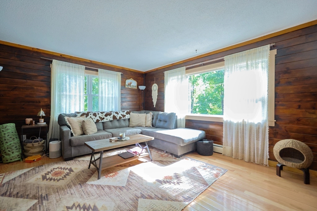 74 Breen Road Hardwick, MA 01037 - Photo 5 of 22 a living room with furniture and a large window