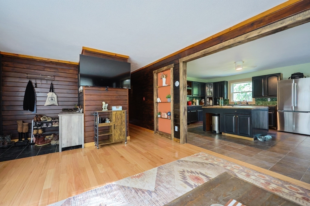 74 Breen Road Hardwick, MA 01037 - Photo 6 of 22 a room with furniture and a kitchen