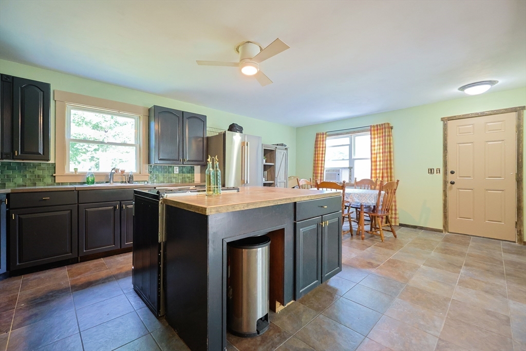 74 Breen Road Hardwick, MA 01037 - Photo 7 of 22 a kitchen with kitchen island granite countertop a sink counter top space and appliances