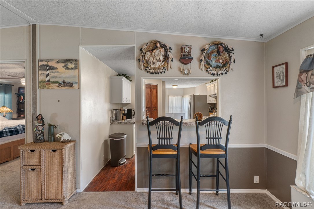 7927 West Cyprian Court Homosassa, FL 34448 - Photo 10 of 40 a view of a dining room with furniture