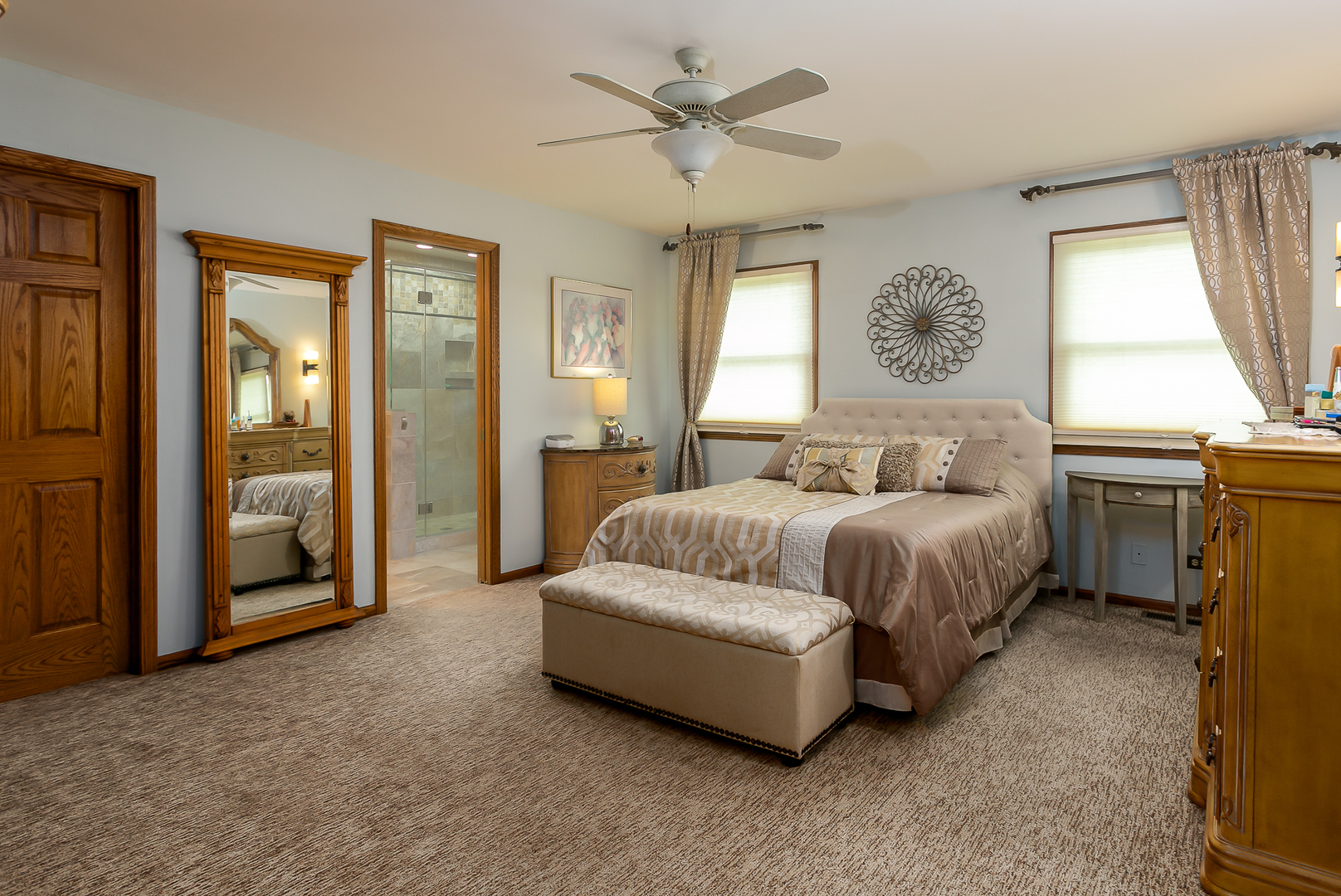 7217 Pierceshire Road Spring Grove, IL 60081 - Photo 14 of 30 a bedroom with a bed and a chandelier