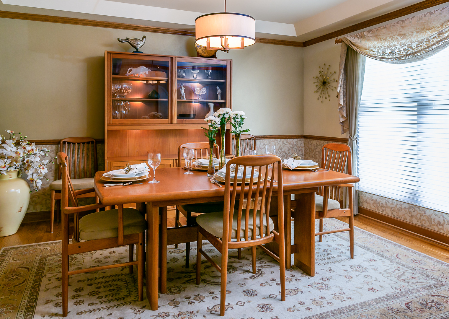7217 Pierceshire Road Spring Grove, IL 60081 - Photo 8 of 30 a view of a dining room with furniture and wooden floor